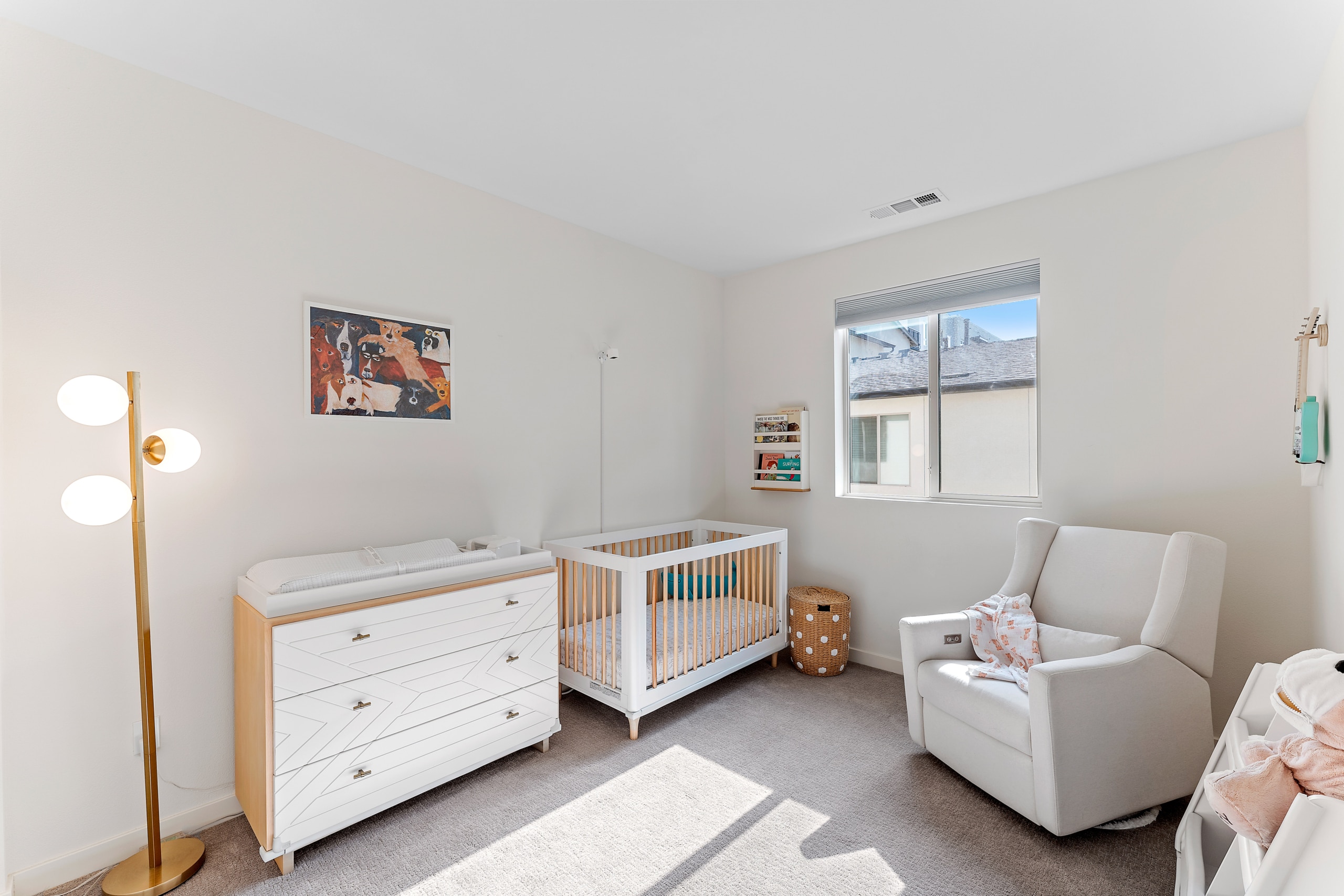 Mini baby's room with baby's court, arm chair, wall painting at 19531 Astor PL