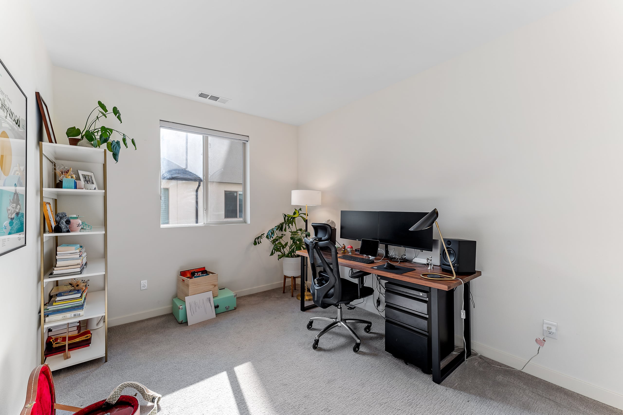 Office set with book shelf and gaming monitor at 19531 Astor PL