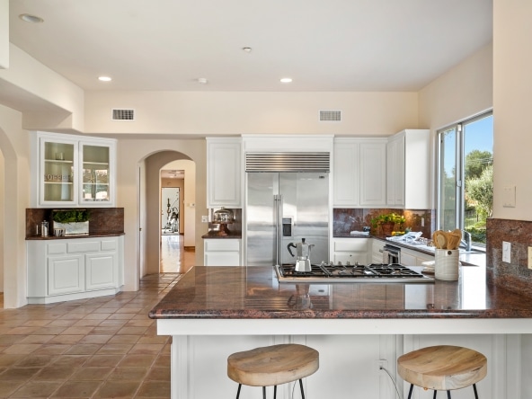 Kitchen Island view with embedded gas stove at 2175 Cold Canyon Road Calabasas