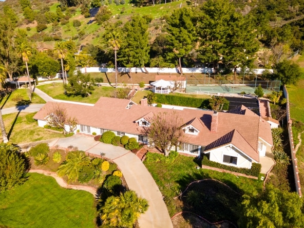 24592 Mulholland Highway - beautiful house property with garden flowers, trees, walkways and mountain view